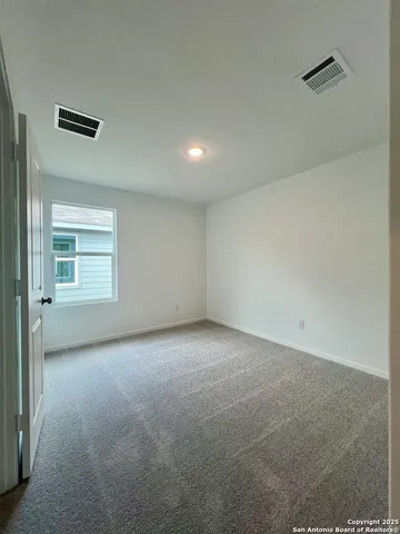 a view of a chair and city view