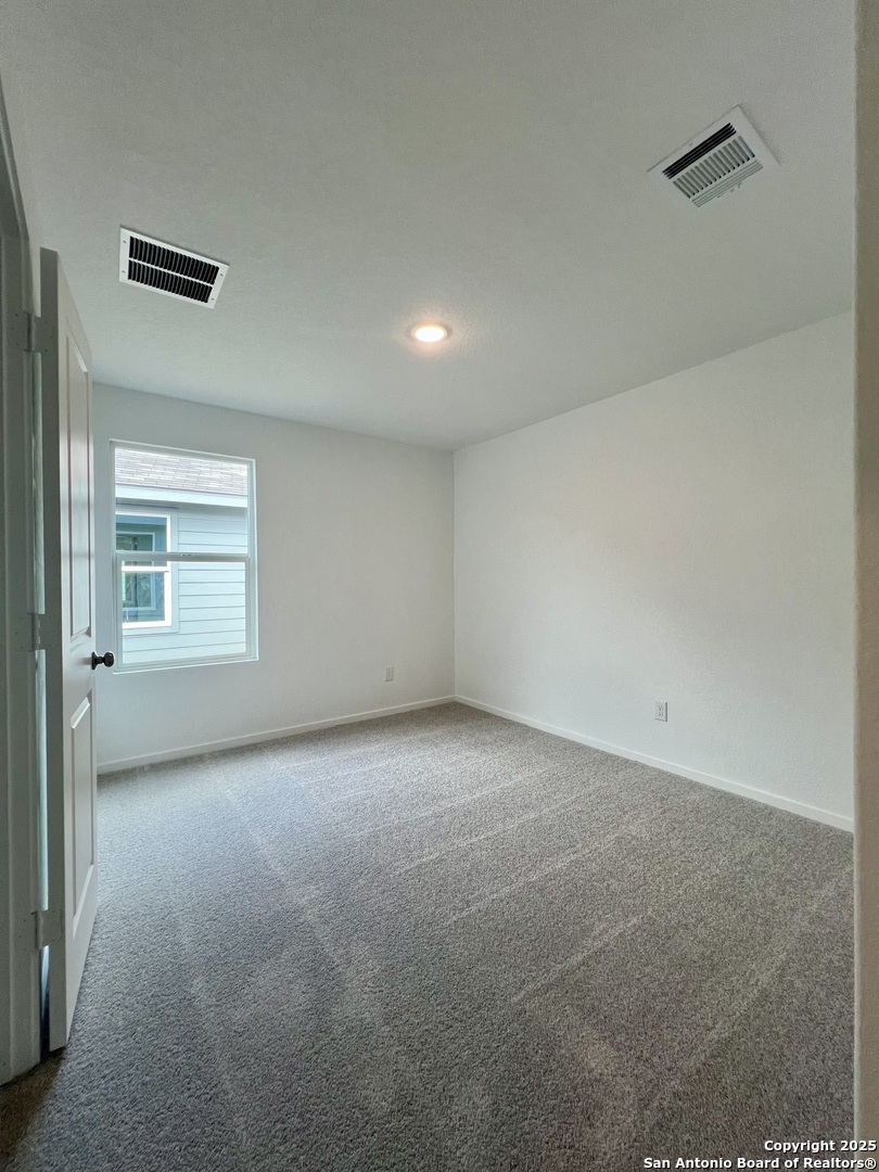 9178 Colonel Trail Seguin, TX 78155 - Photo 46 of 59 a view of an empty room with a window