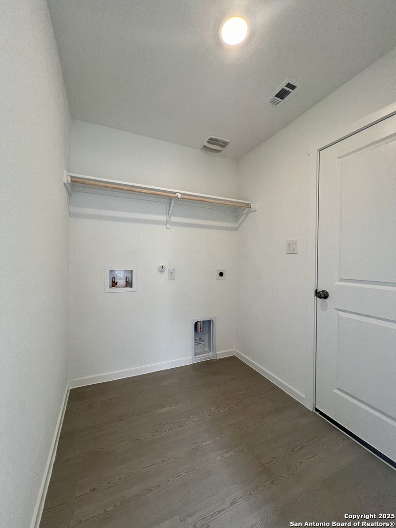 9178 Colonel Trail Seguin, TX 78155 - Photo 6 of 59 a view of a room with racks on the wall