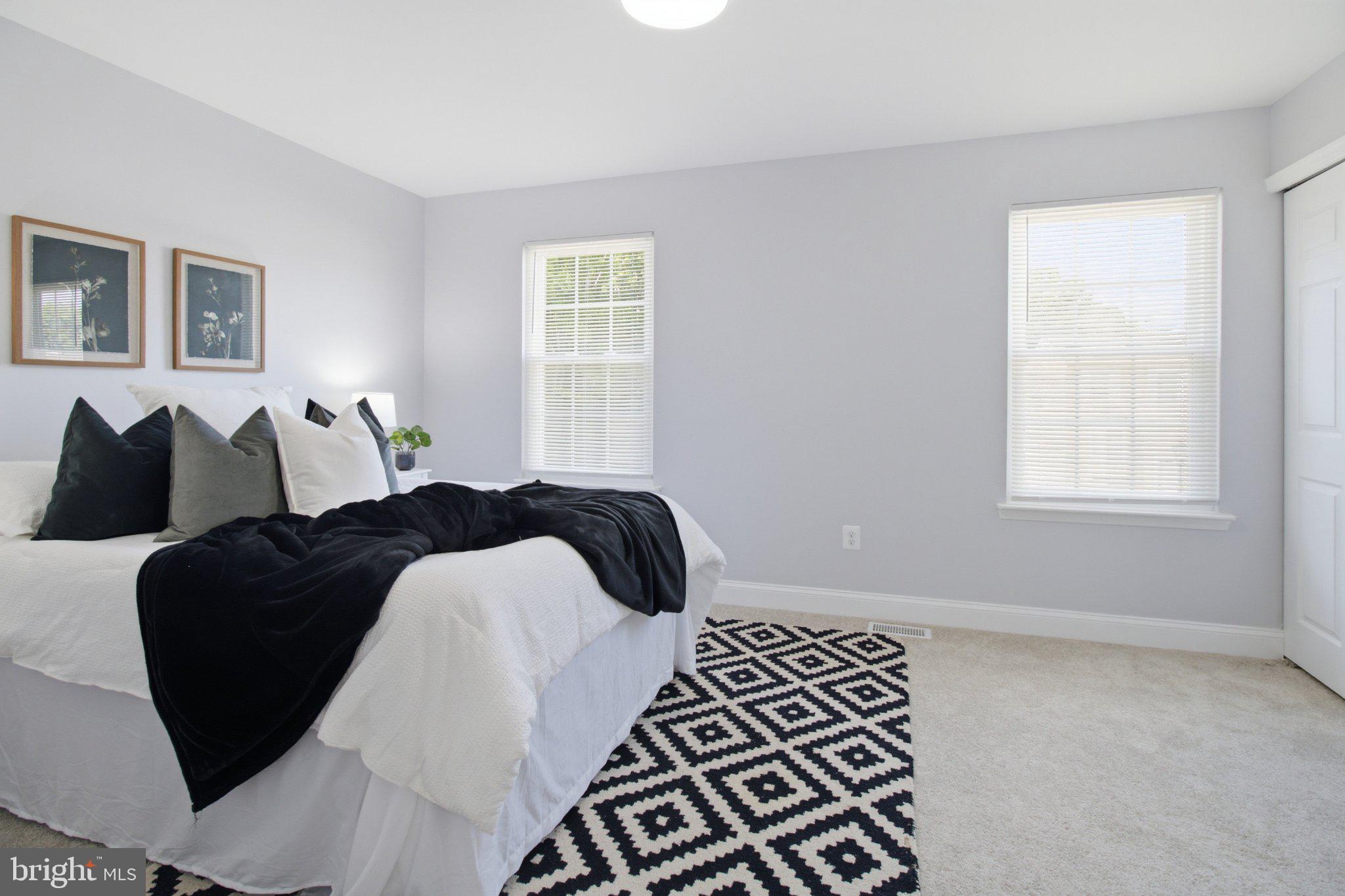 403 Kosoak Road Middle River, MD 21220 - Photo 17 of 23 Serene bedroom with natural light.
