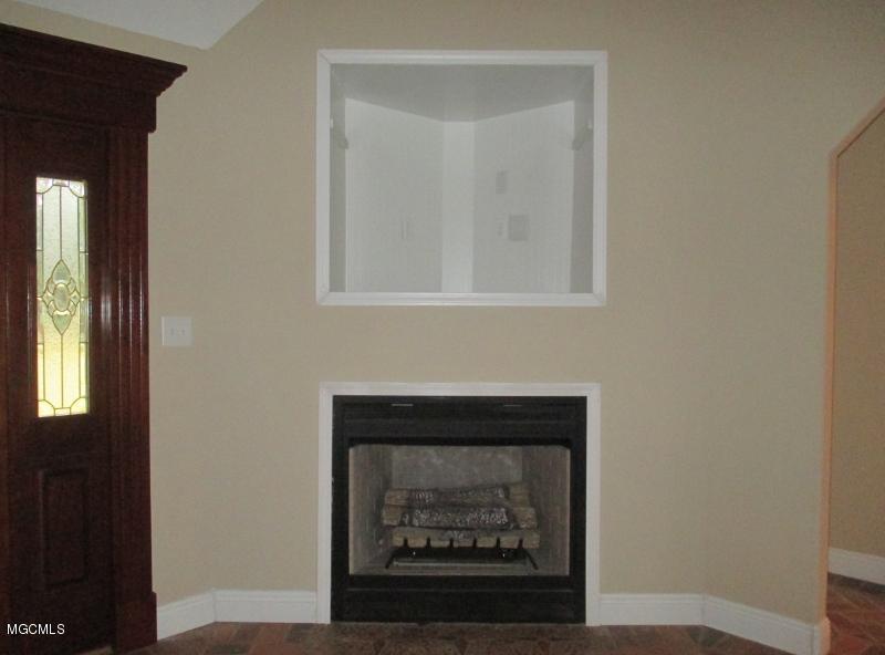 6113 C Byrd Road Ocean Springs, MS 39564 - Photo 11 of 28 FIREPLACE VIEW