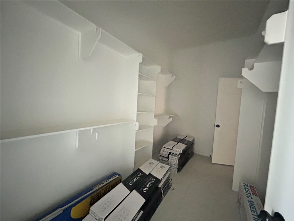 1648 Frontera Ranch College Station, TX 77845 - Photo 8 of 24 a room with storage and utility