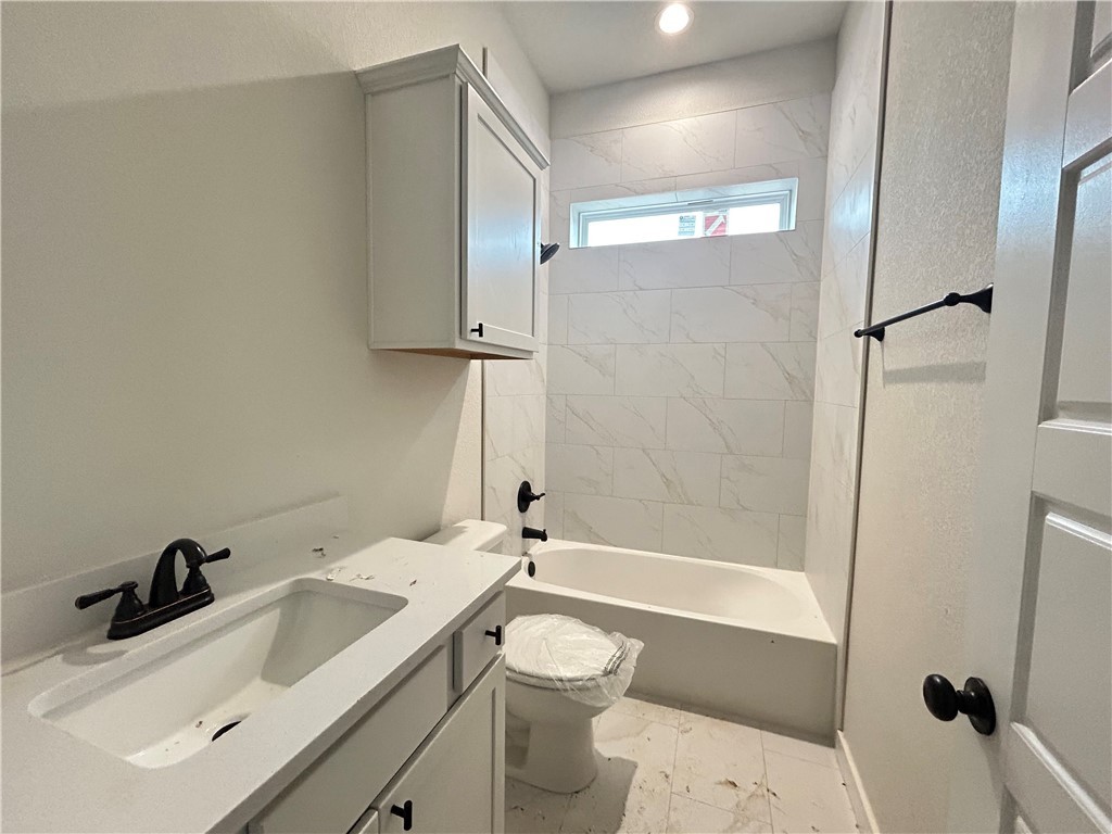1648 Frontera Ranch College Station, TX 77845 - Photo 10 of 24 a bathroom with a sink toilet tub and shower