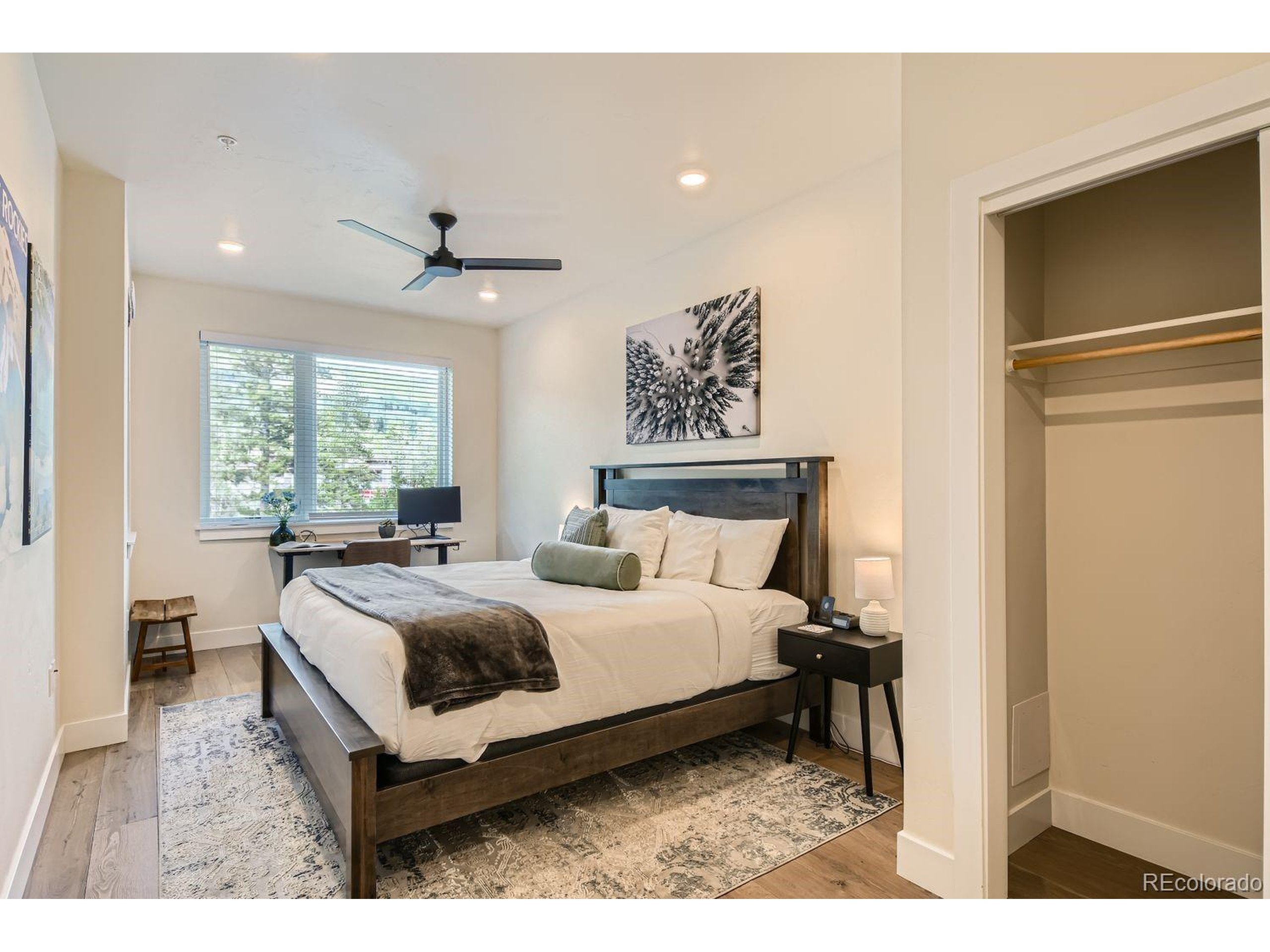 0075 Clearwater Way, Unit 302 Dillon, CO 80435 - Photo 11 of 33 a living room with a bed furniture and a window