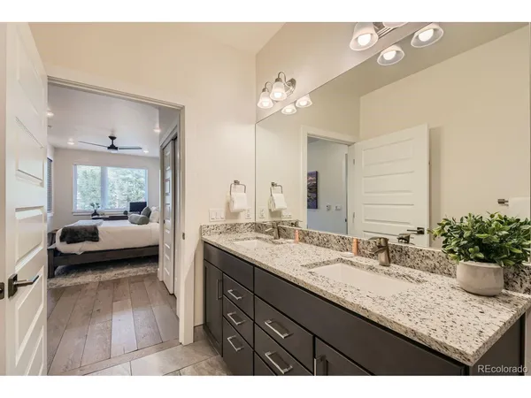 a bedroom with a bed and a cabinets