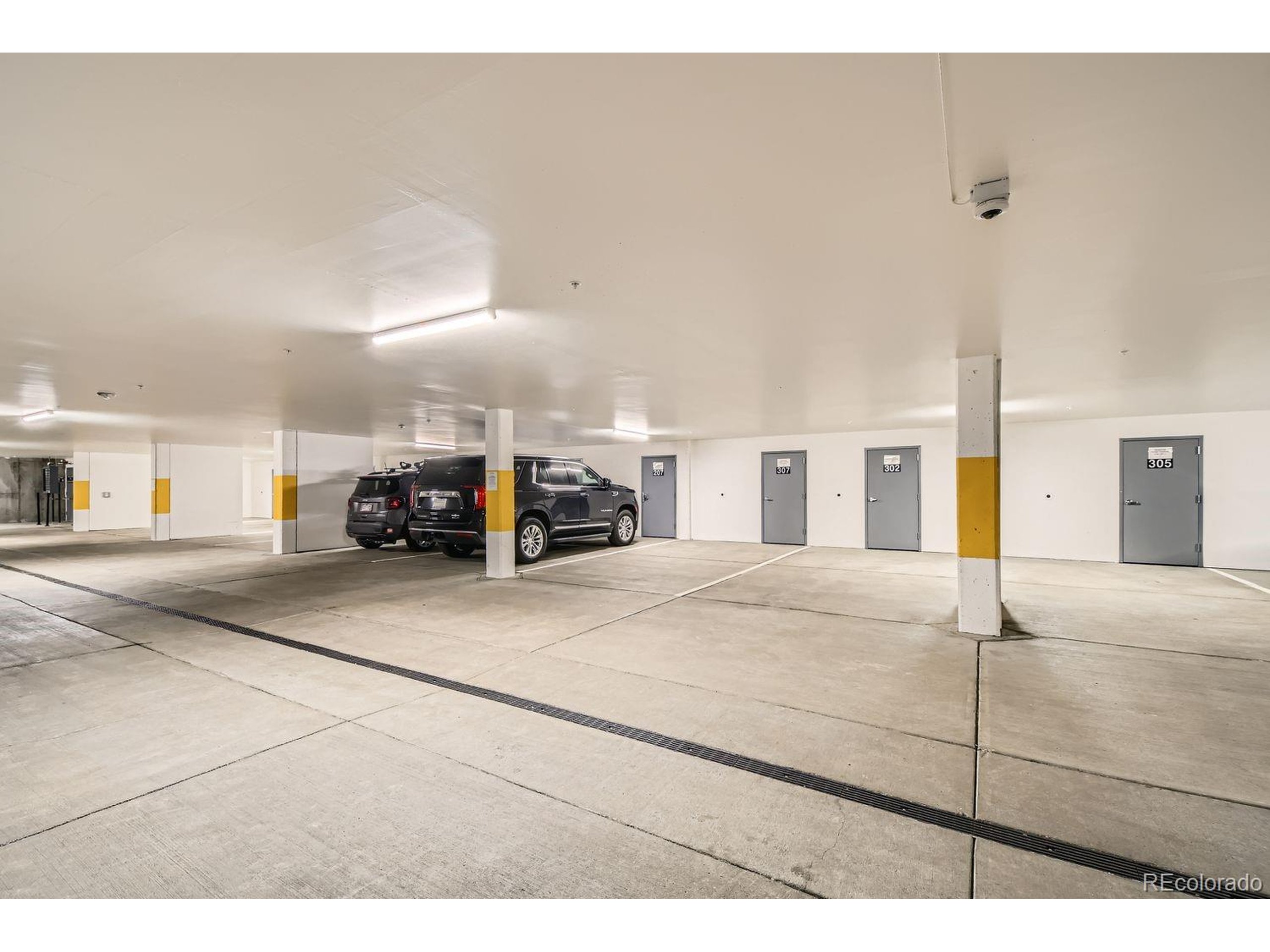 0075 Clearwater Way, Unit 302 Dillon, CO 80435 - Photo 19 of 33 a view of a building with car parked