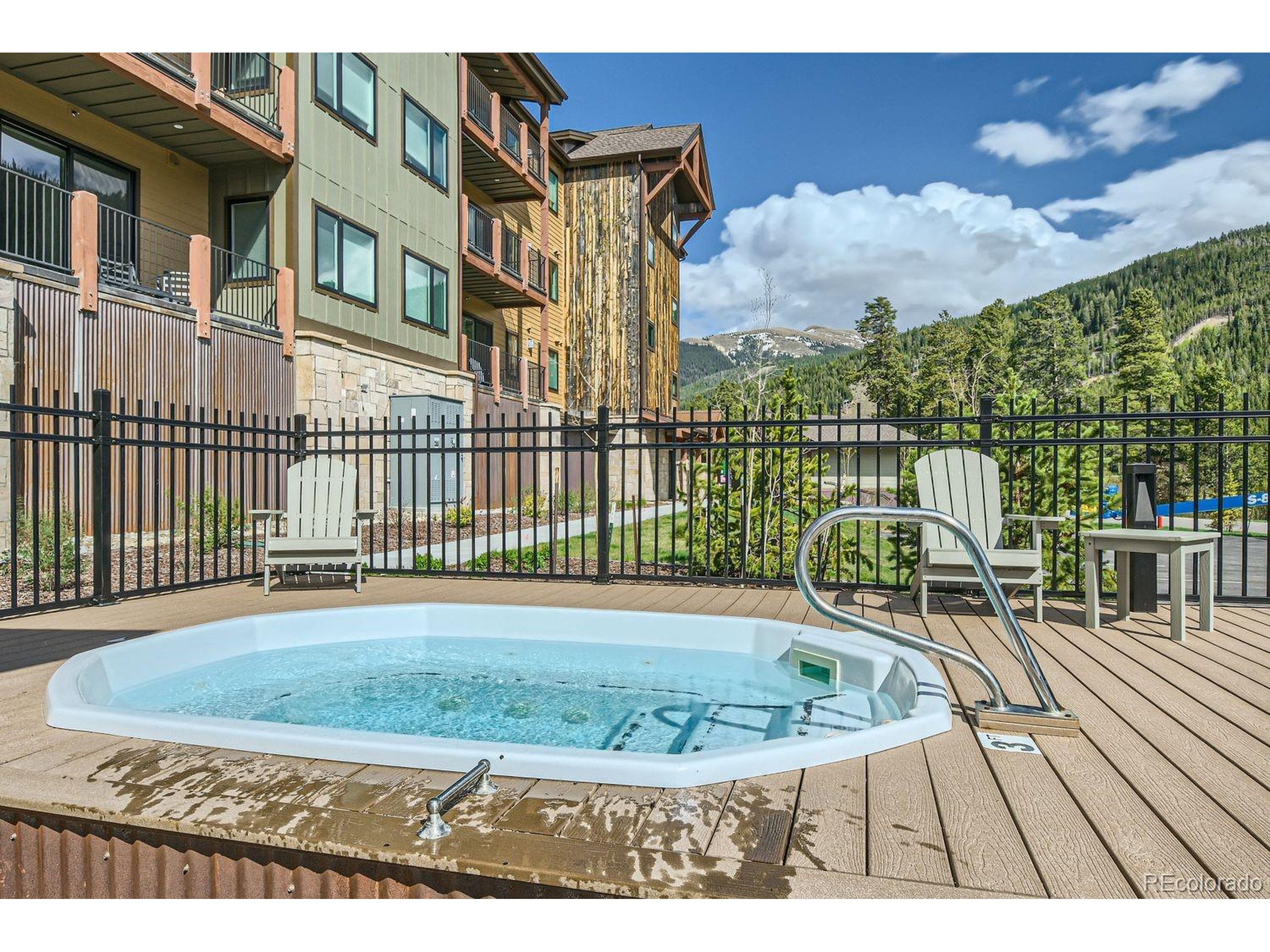 0075 Clearwater Way, Unit 302 Dillon, CO 80435 - Photo 21 of 33 a view of a house with a swimming pool