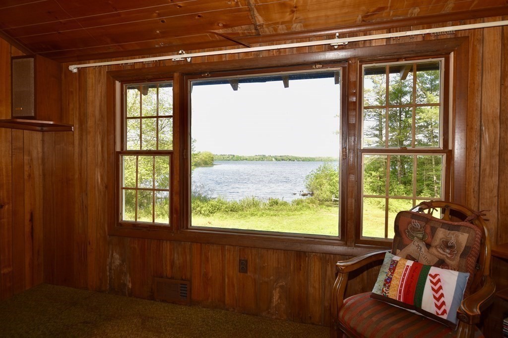 572 Snipatuit Road Rochester, MA 02770 - Photo 3 of 6 a living room with furniture and a window