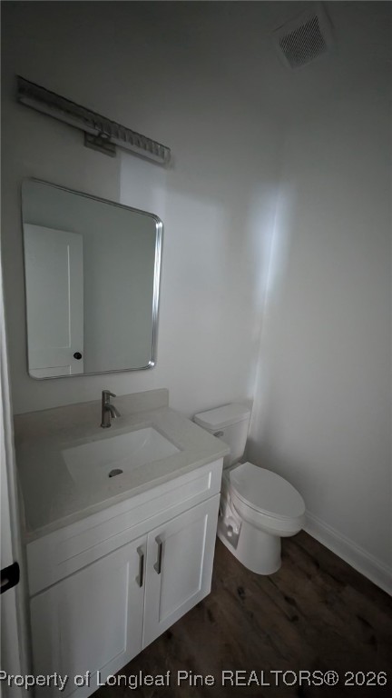 5130 Cardinal Circle Sanford, NC 27332 - Photo 15 of 36 a bathroom with a sink toilet and mirror
