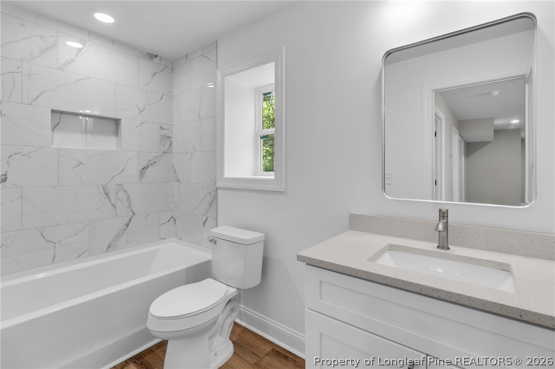 5130 Cardinal Circle Sanford, NC 27332 - Photo 28 of 45 a bathroom with a sink toilet and bathtub