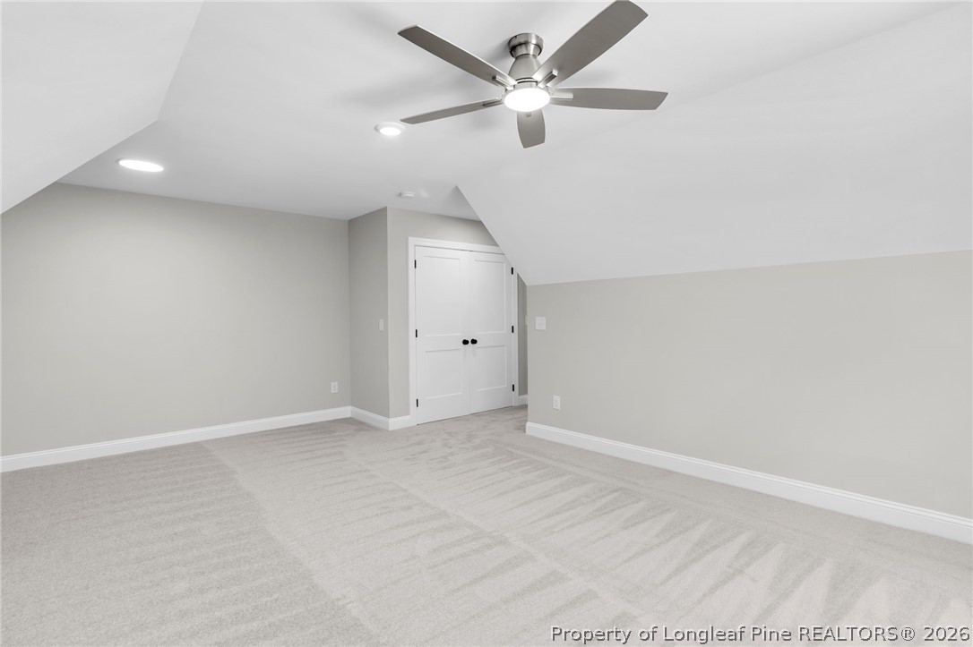 5130 Cardinal Circle Sanford, NC 27332 - Photo 35 of 45 an empty room with a ceiling fan and a window