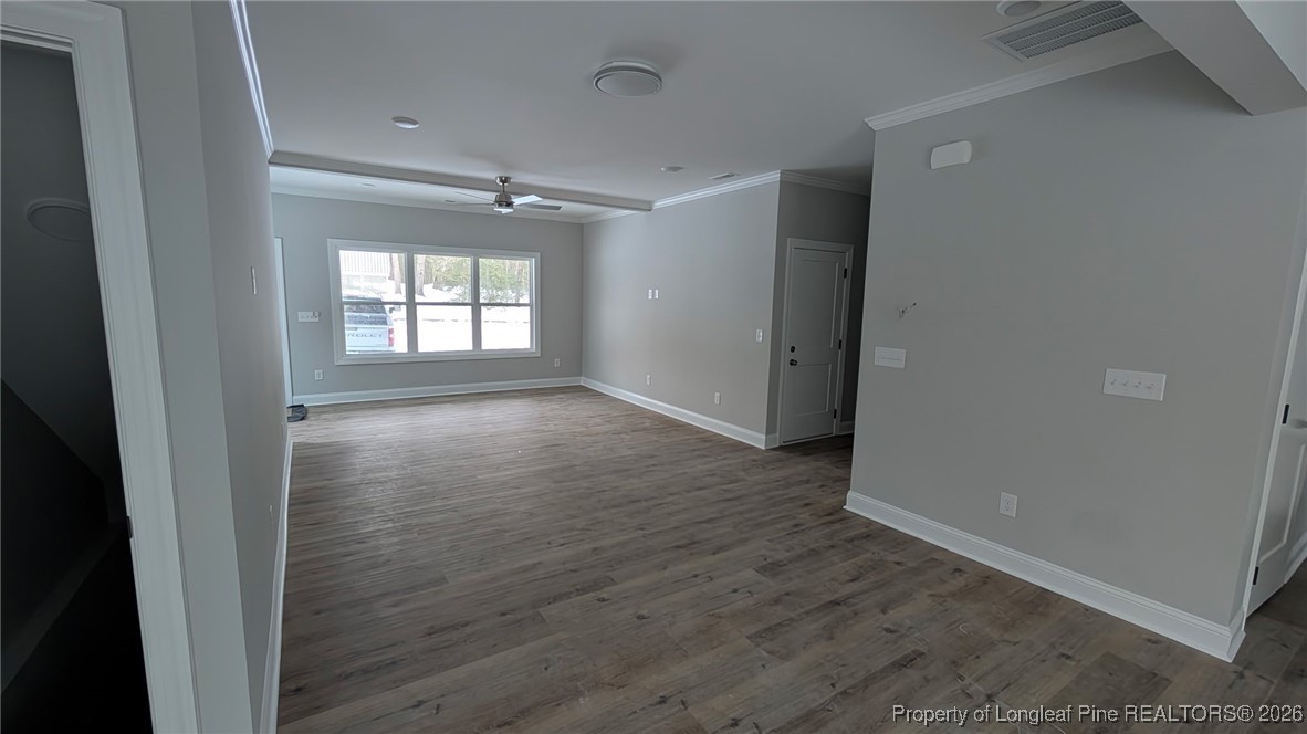 5130 Cardinal Circle Sanford, NC 27332 - Photo 4 of 36 wooden floor in an empty room with a window