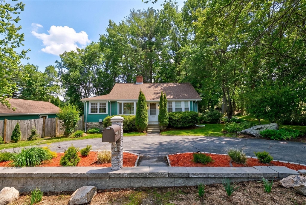 14 Francis Wyman Road Burlington, MA 01803 - Photo 2 of 41 a front view of a house with garden