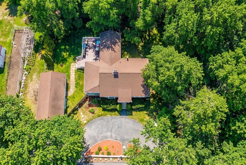14 Francis Wyman Road Burlington, MA 01803 - Photo 34 of 41 an aerial view of a house with a swimming pool a yard and outdoor seating