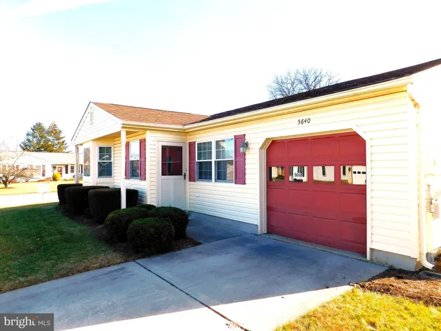 a view of swimming pool with a yard