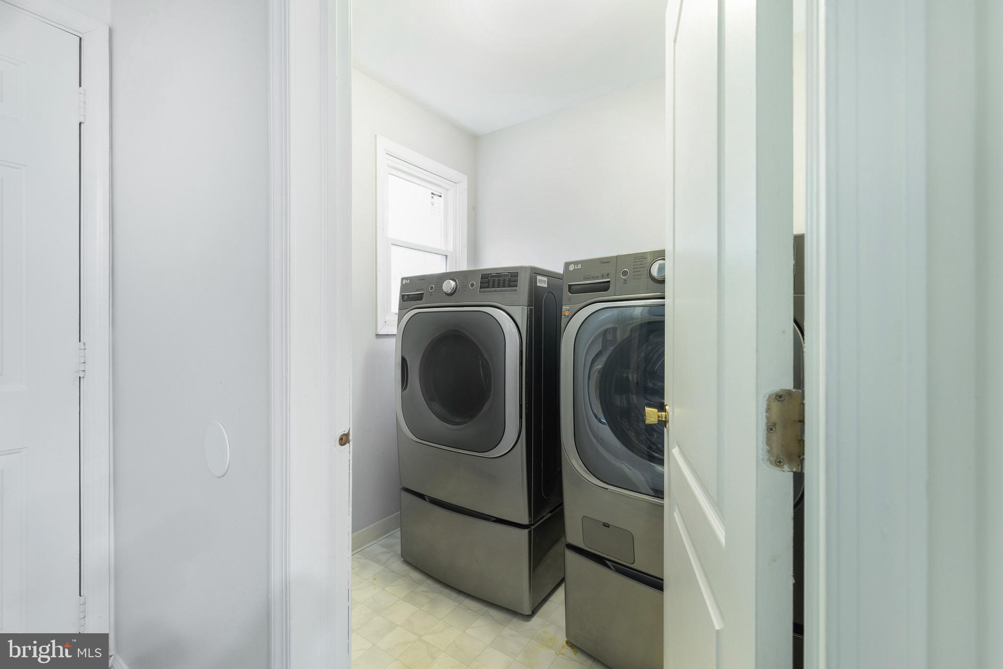 93 Nursery Drive Bear, DE 19701 - Photo 11 of 43 a utility room with dryer and washer