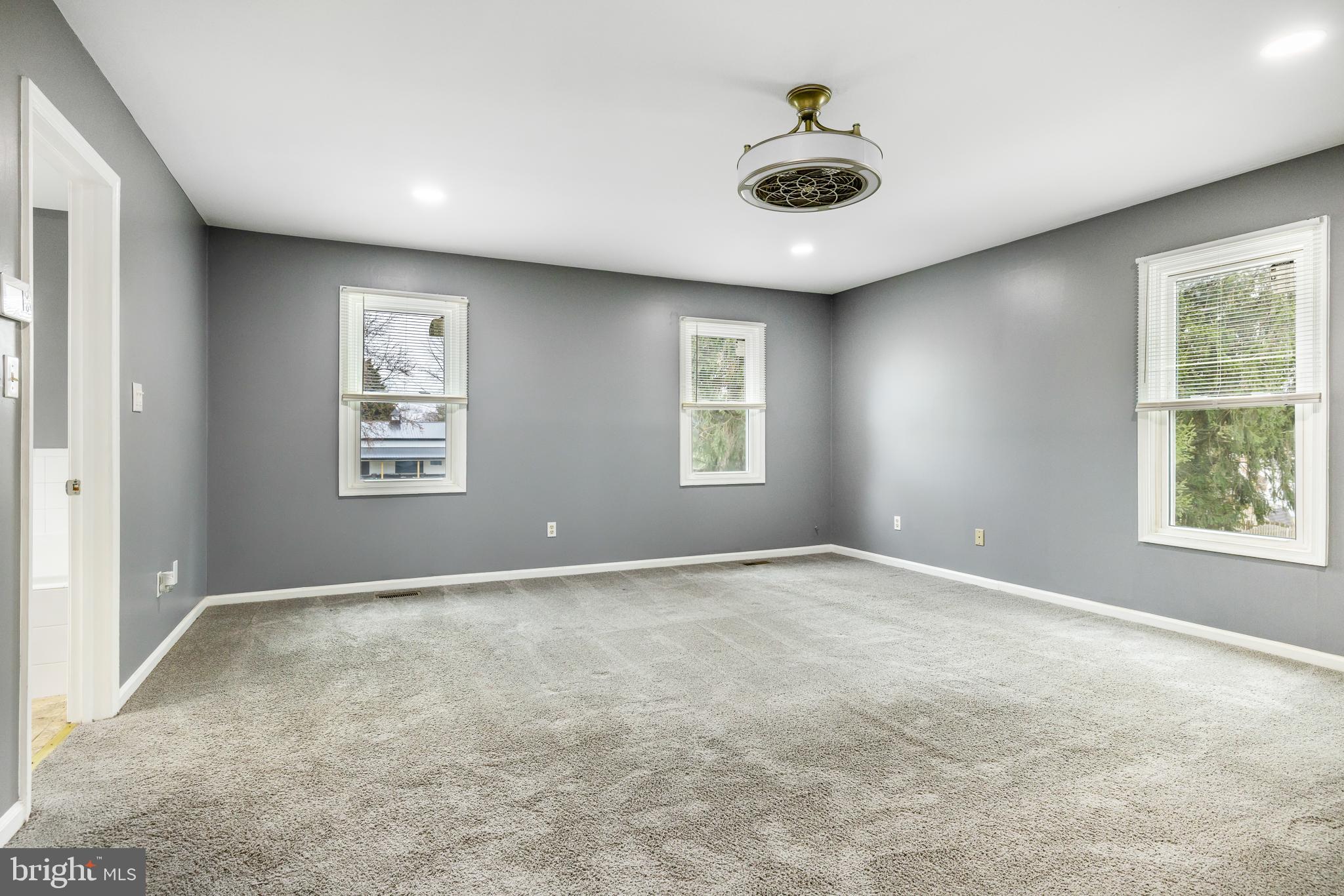 93 Nursery Drive Bear, DE 19701 - Photo 16 of 43 an empty room with windows and closet