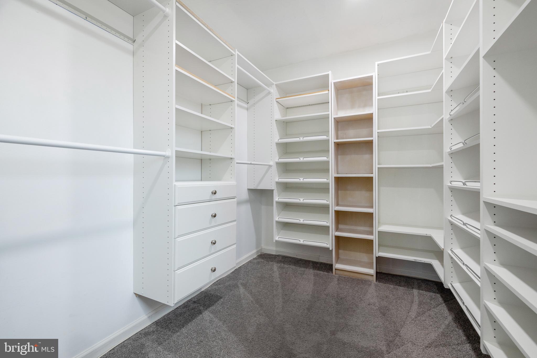 93 Nursery Drive Bear, DE 19701 - Photo 17 of 43 a view of walk in closet with empty racks