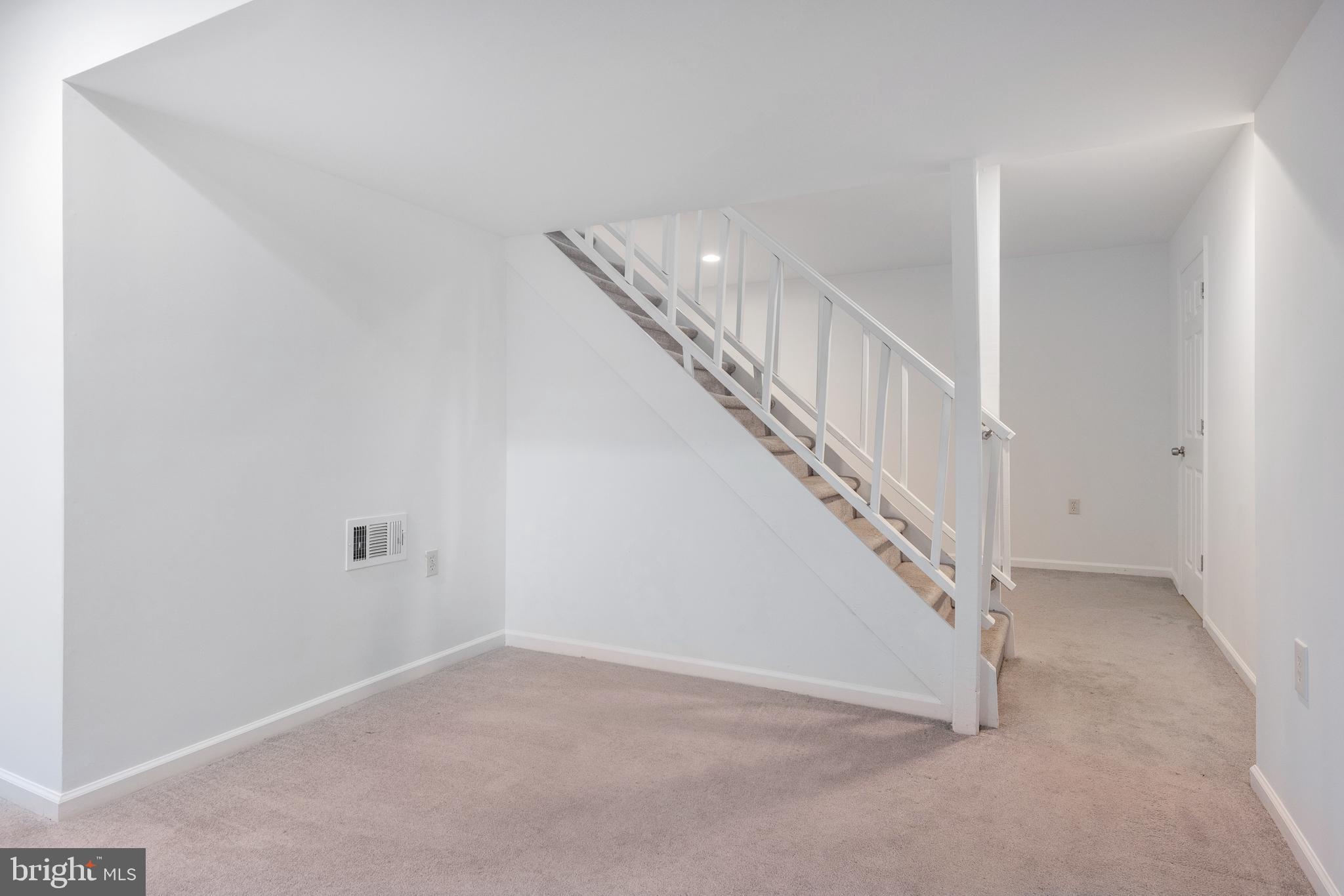93 Nursery Drive Bear, DE 19701 - Photo 35 of 43 a view of a hallway with staircase