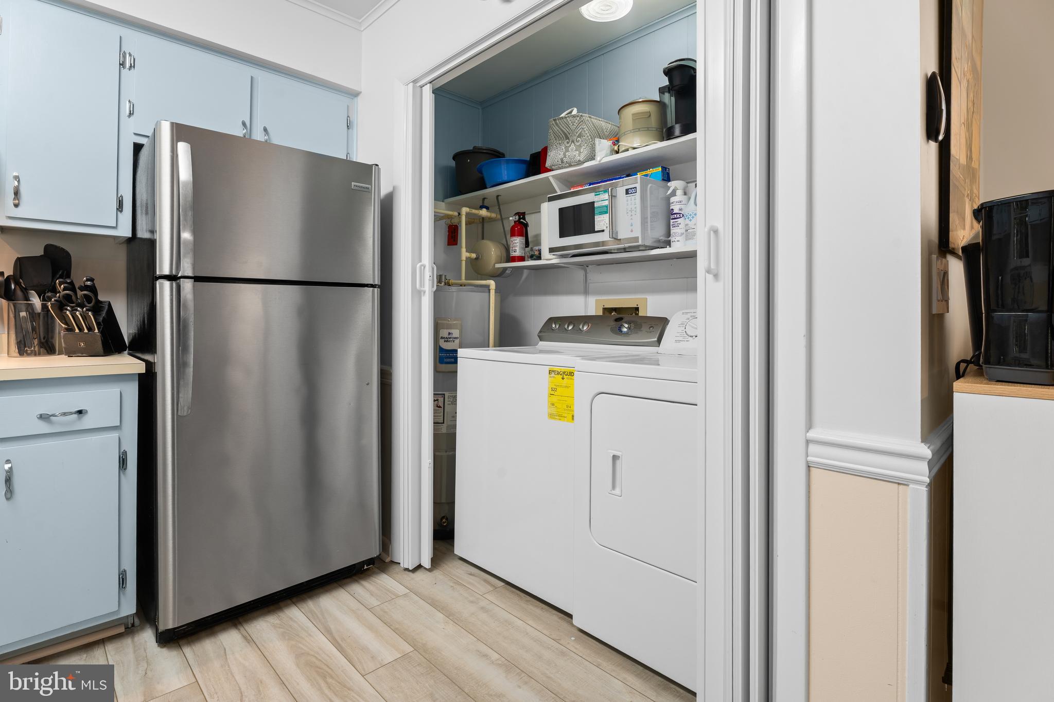 85 Ocean Parkway Ocean Pines, MD 21811 - Photo 21 of 78 a kitchen with stainless steel appliances a refrigerator a sink and cabinets