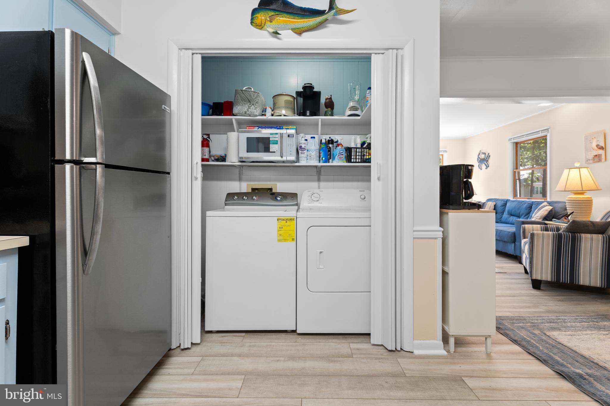 85 Ocean Parkway Ocean Pines, MD 21811 - Photo 22 of 78 a kitchen with stainless steel appliances granite countertop a refrigerator and a wooden floors