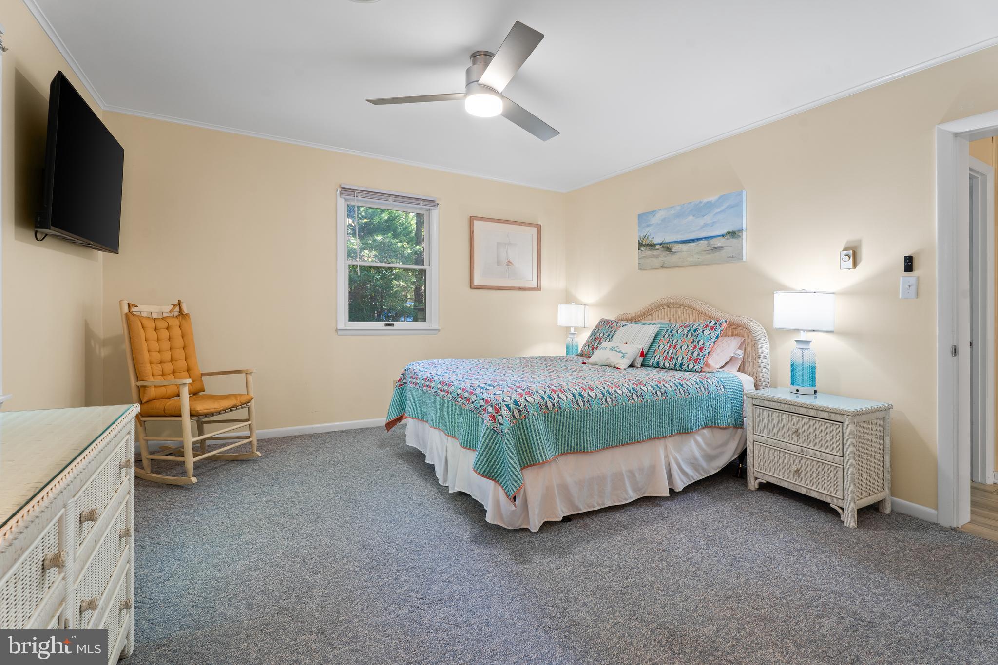 85 Ocean Parkway Ocean Pines, MD 21811 - Photo 28 of 78 a bedroom with a bed and a flat screen tv
