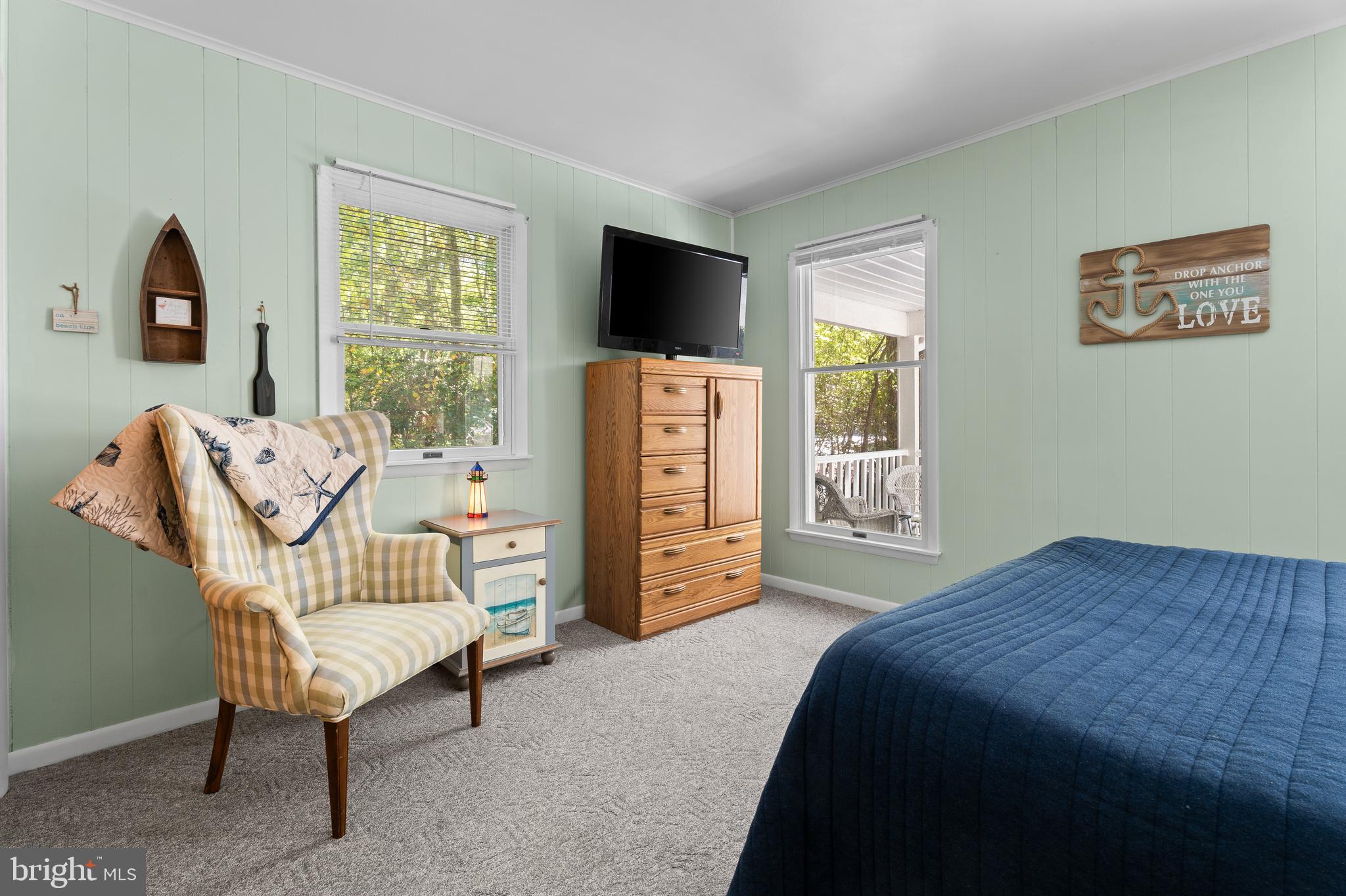 85 Ocean Parkway Ocean Pines, MD 21811 - Photo 35 of 78 a bedroom with furniture and a flat screen tv