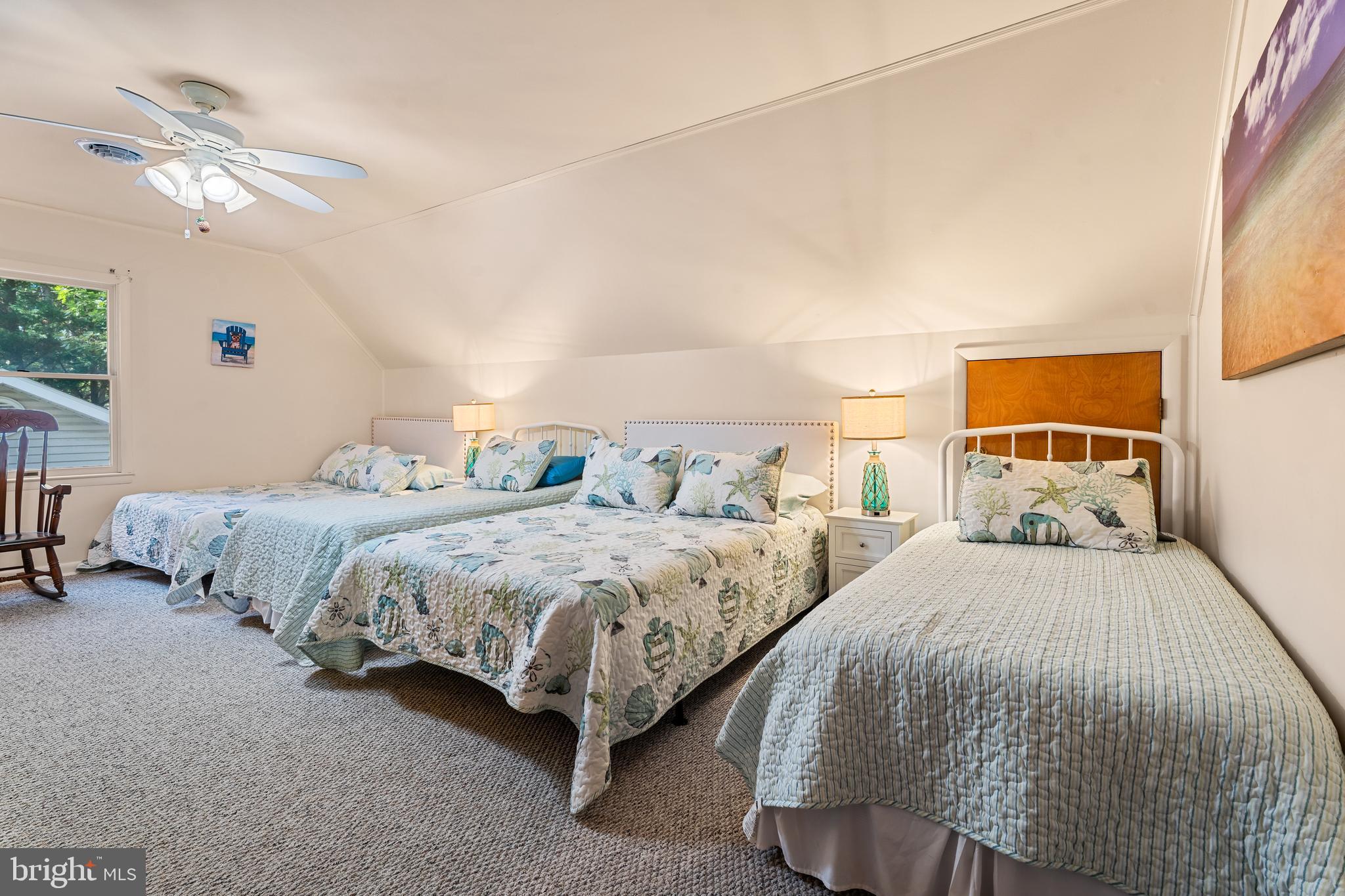 85 Ocean Parkway Ocean Pines, MD 21811 - Photo 44 of 78 a bedroom with two beds and painting on the wall