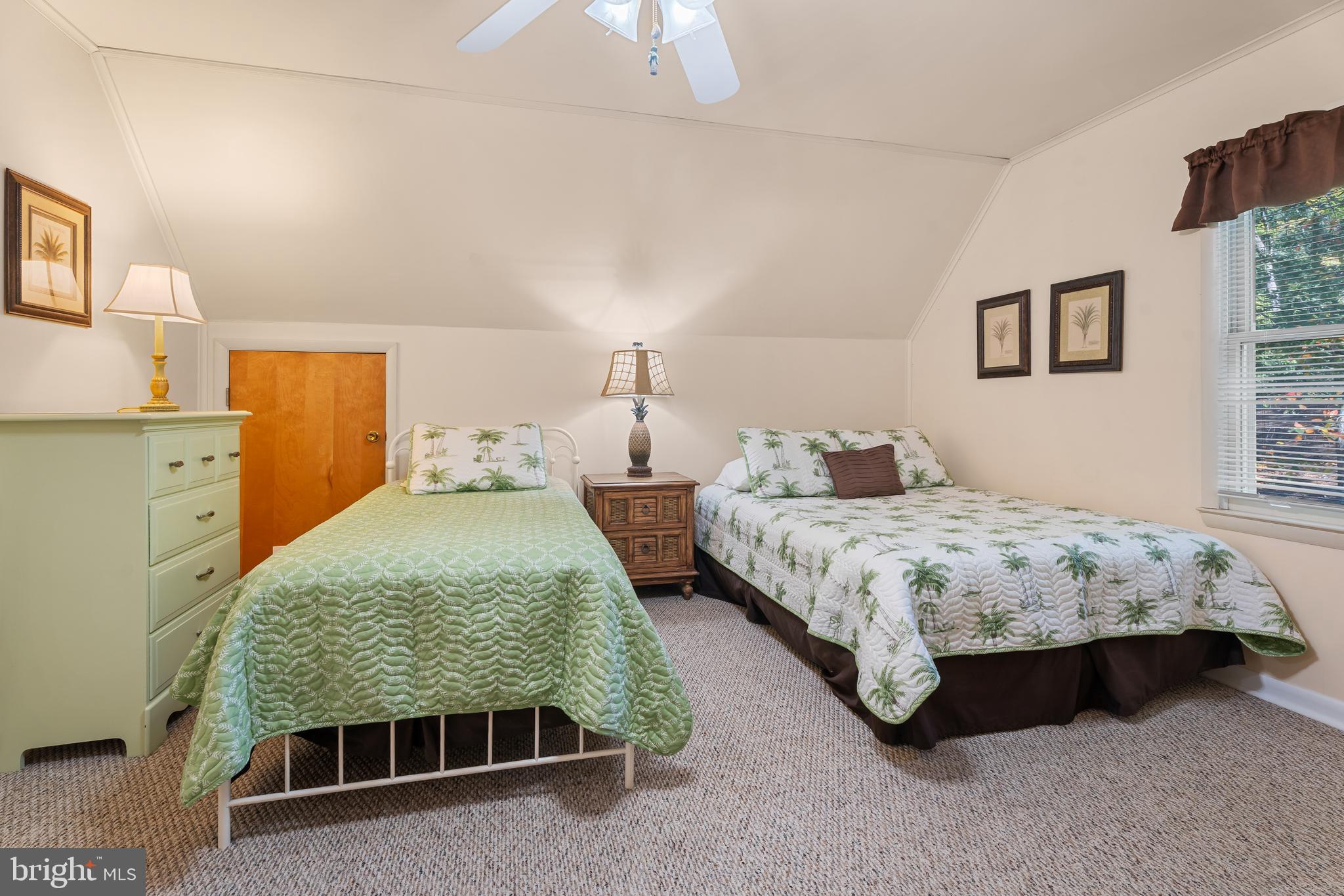 85 Ocean Parkway Ocean Pines, MD 21811 - Photo 48 of 78 a bedroom with two beds and painting on the wall