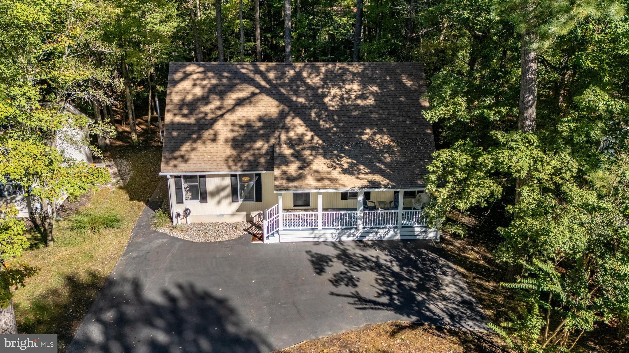 85 Ocean Parkway Ocean Pines, MD 21811 - Photo 59 of 78 a view of house with outdoor space and trees around