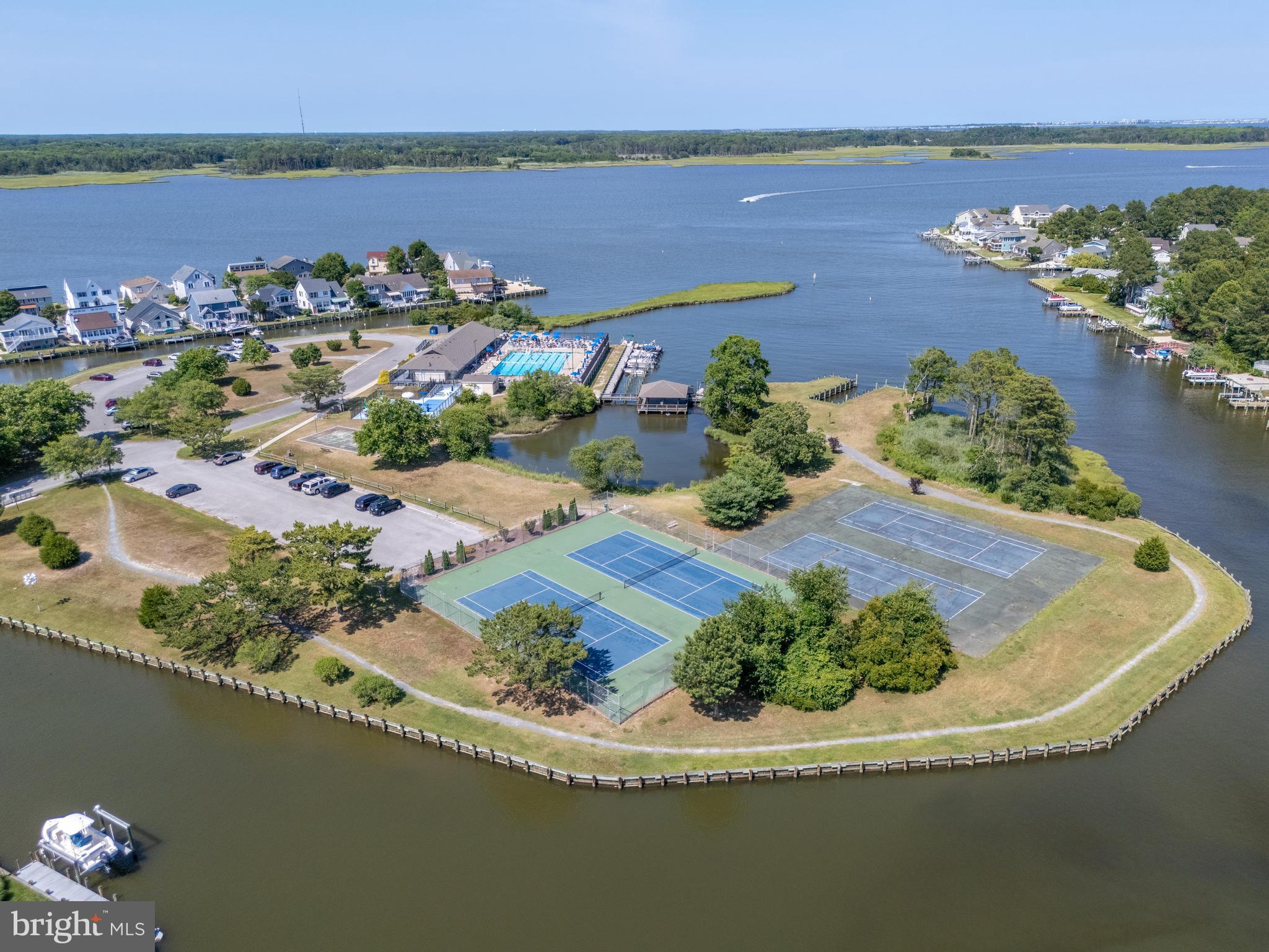 85 Ocean Parkway Ocean Pines, MD 21811 - Photo 69 of 78 an aerial view of a house with a lake view