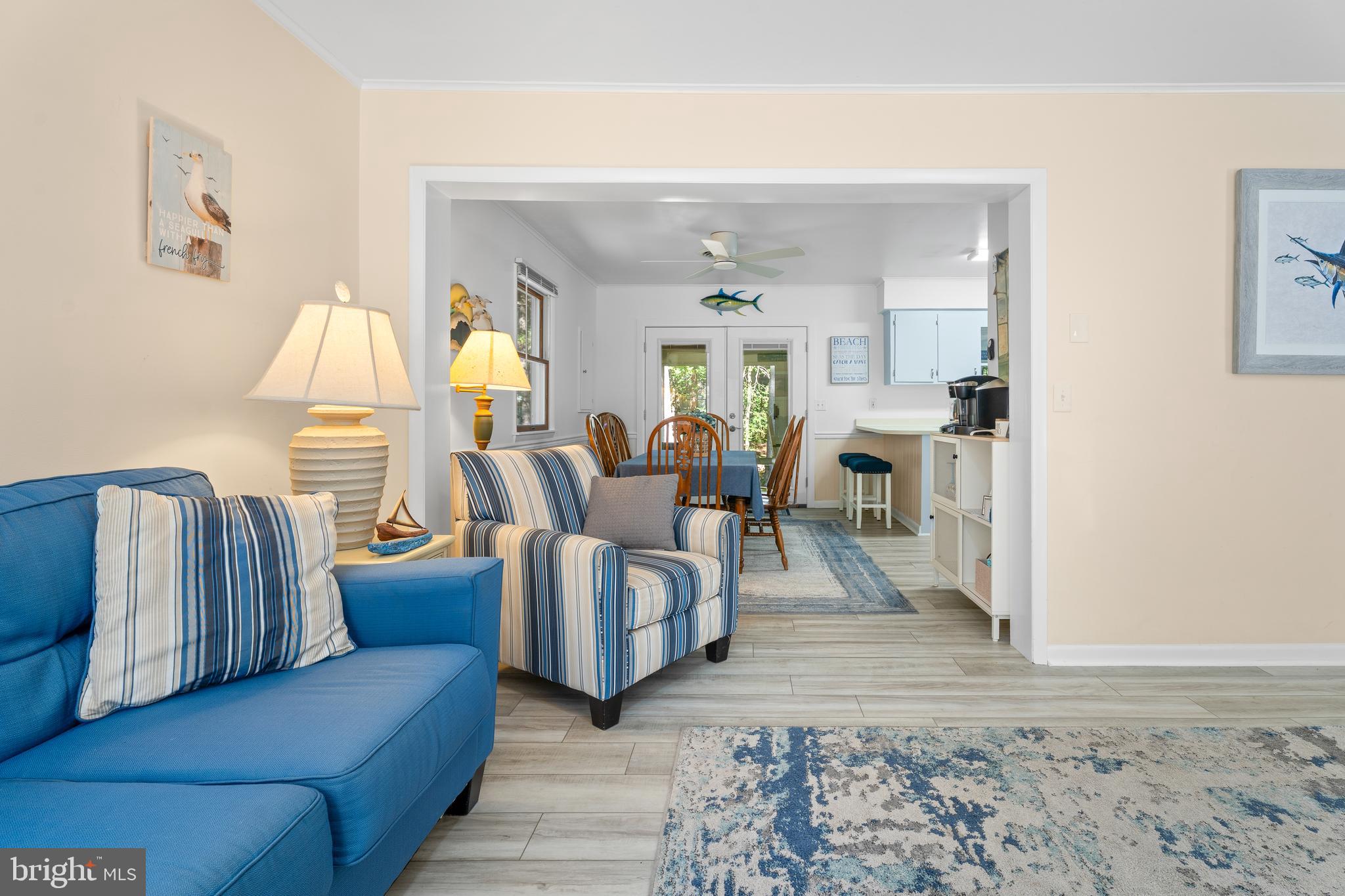 85 Ocean Parkway Ocean Pines, MD 21811 - Photo 7 of 78 a living room with furniture and a fireplace