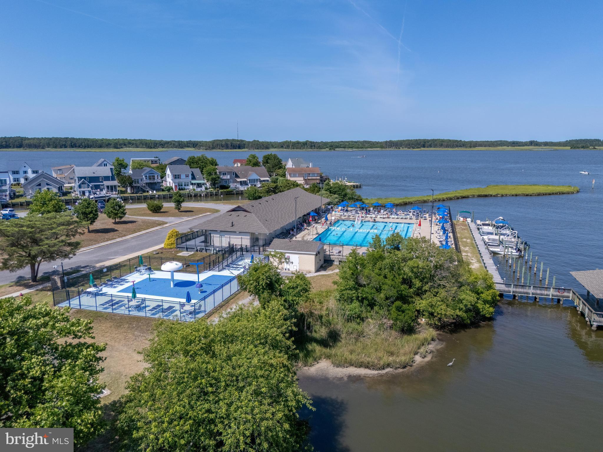 85 Ocean Parkway Ocean Pines, MD 21811 - Photo 71 of 78 an aerial view of a house with a lake view
