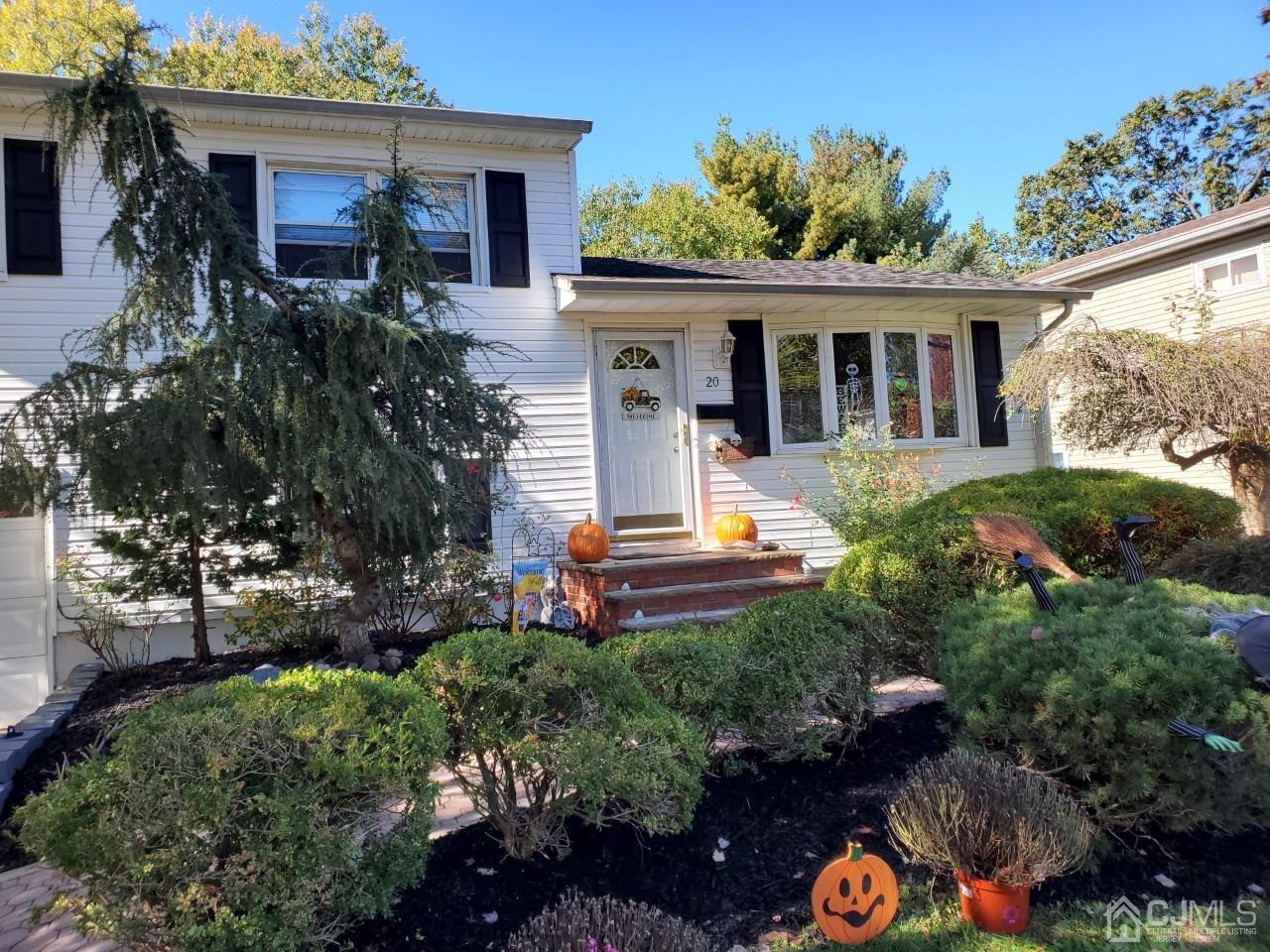 20 Finley Road Edison, NJ 08817 - Photo 1 of 16 front view of a house with a yard
