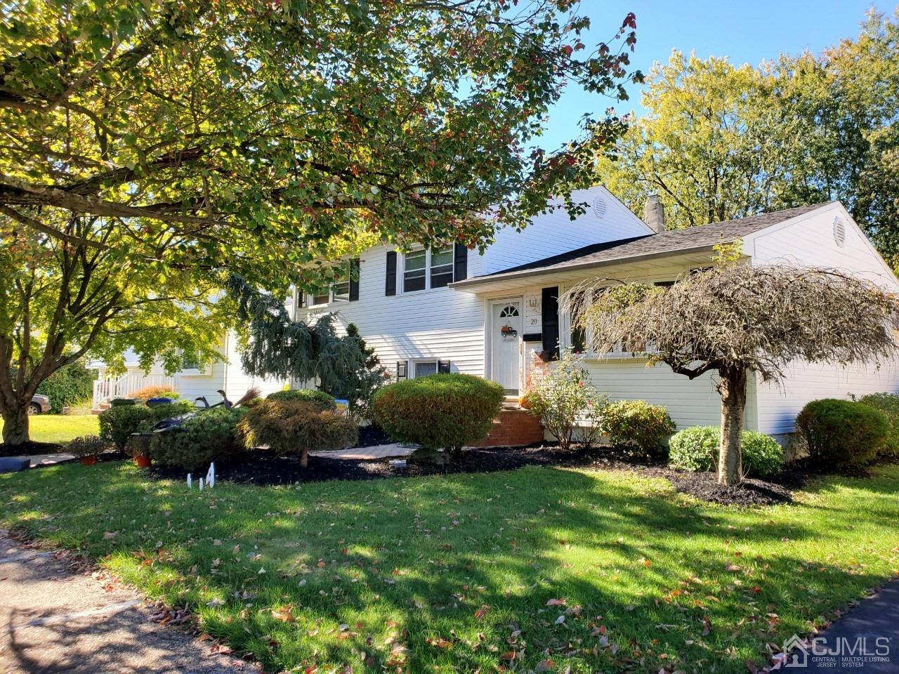 20 Finley Road Edison, NJ 08817 - Photo 4 of 16 a view of a house with a backyard
