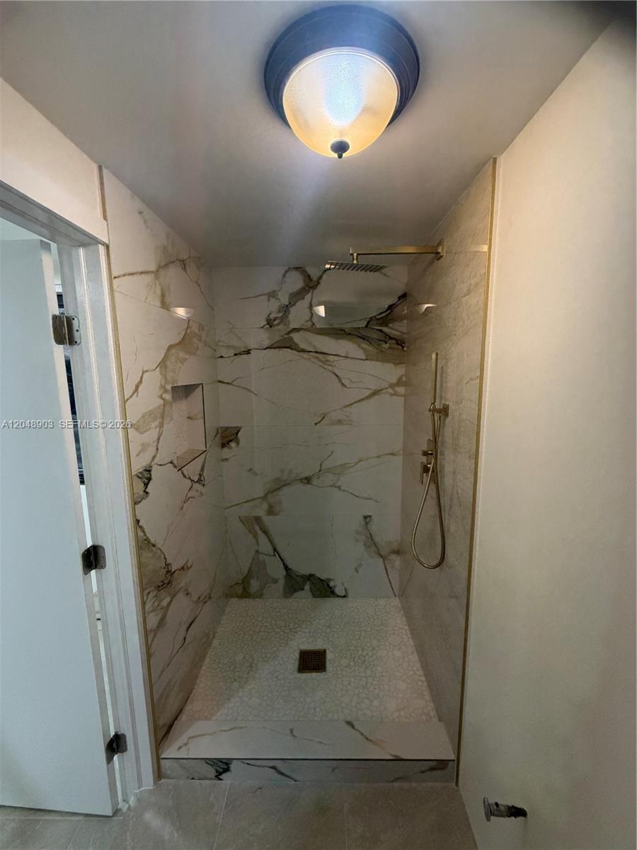 725 Southwest 1st Avenue, Unit 1 Homestead, FL 33030 - Photo 3 of 10 Nicho / Shelf in bathroom.