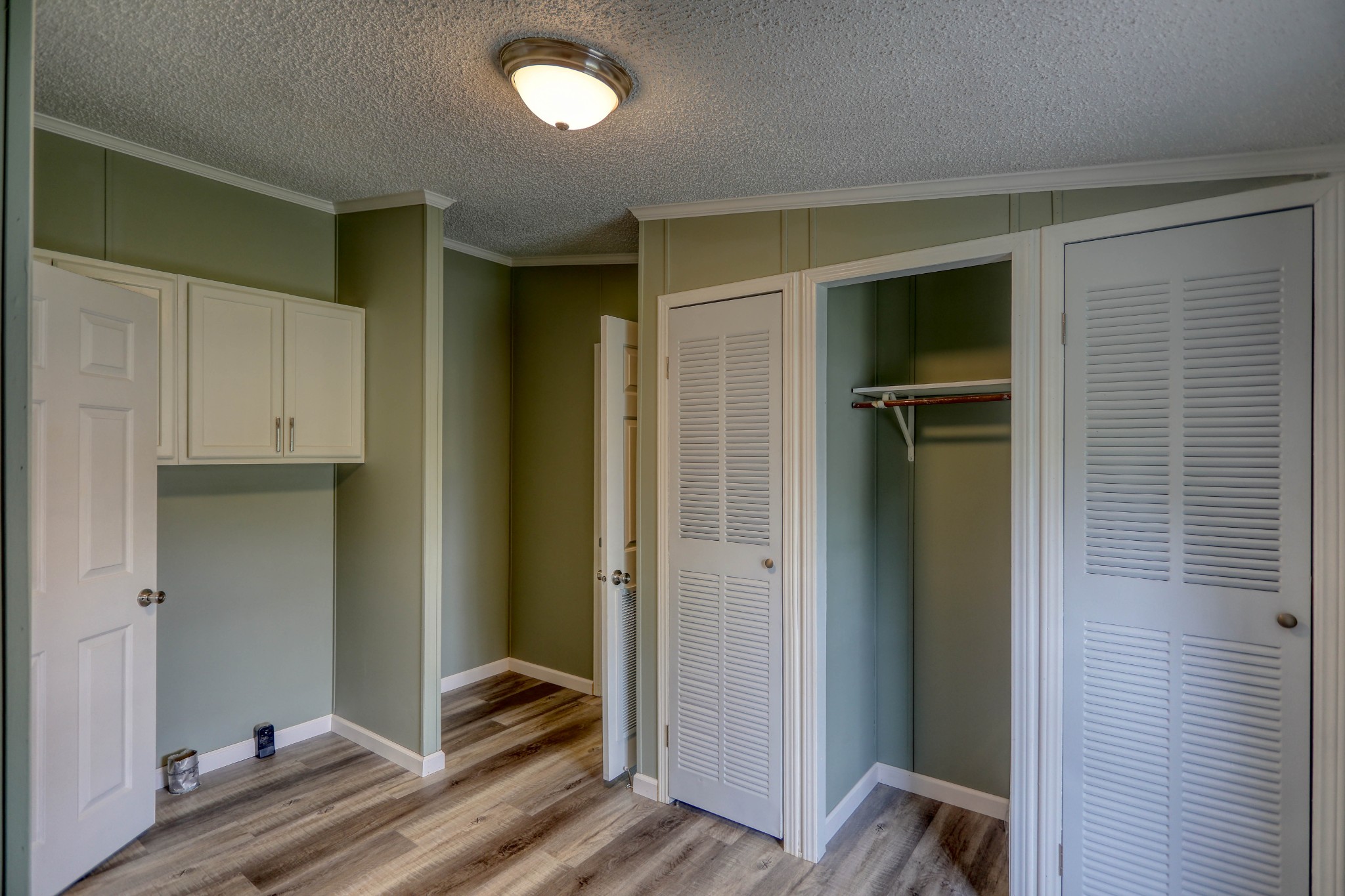 1834 Oak Grove Church Road Adolphus, KY 42120 - Photo 11 of 31 a view of a hallway with bedroom and wooden floor