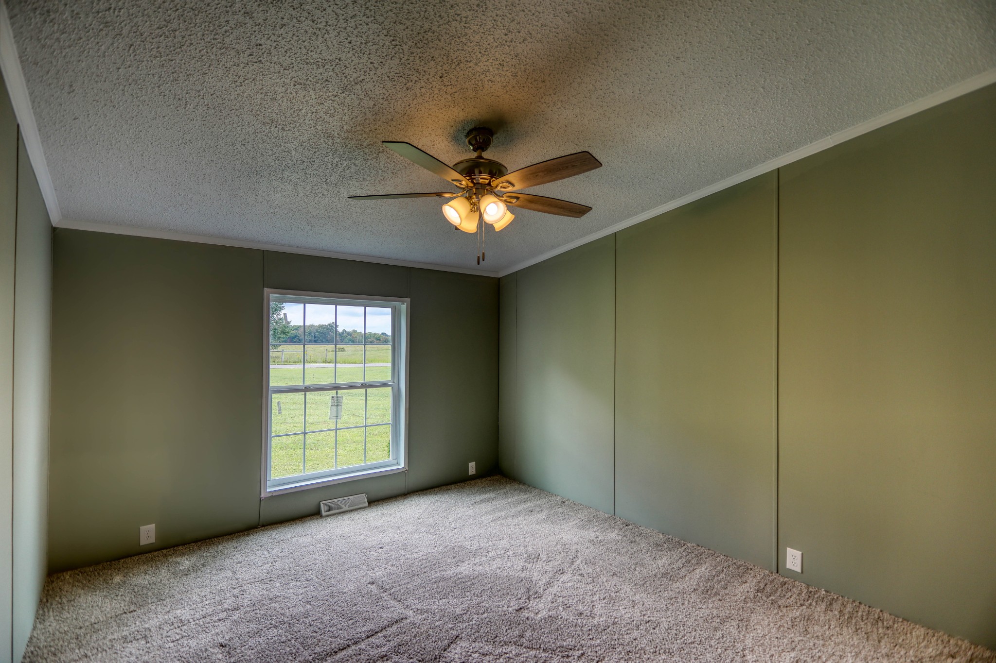 1834 Oak Grove Church Road Adolphus, KY 42120 - Photo 19 of 31 an empty room with windows and ceiling fan