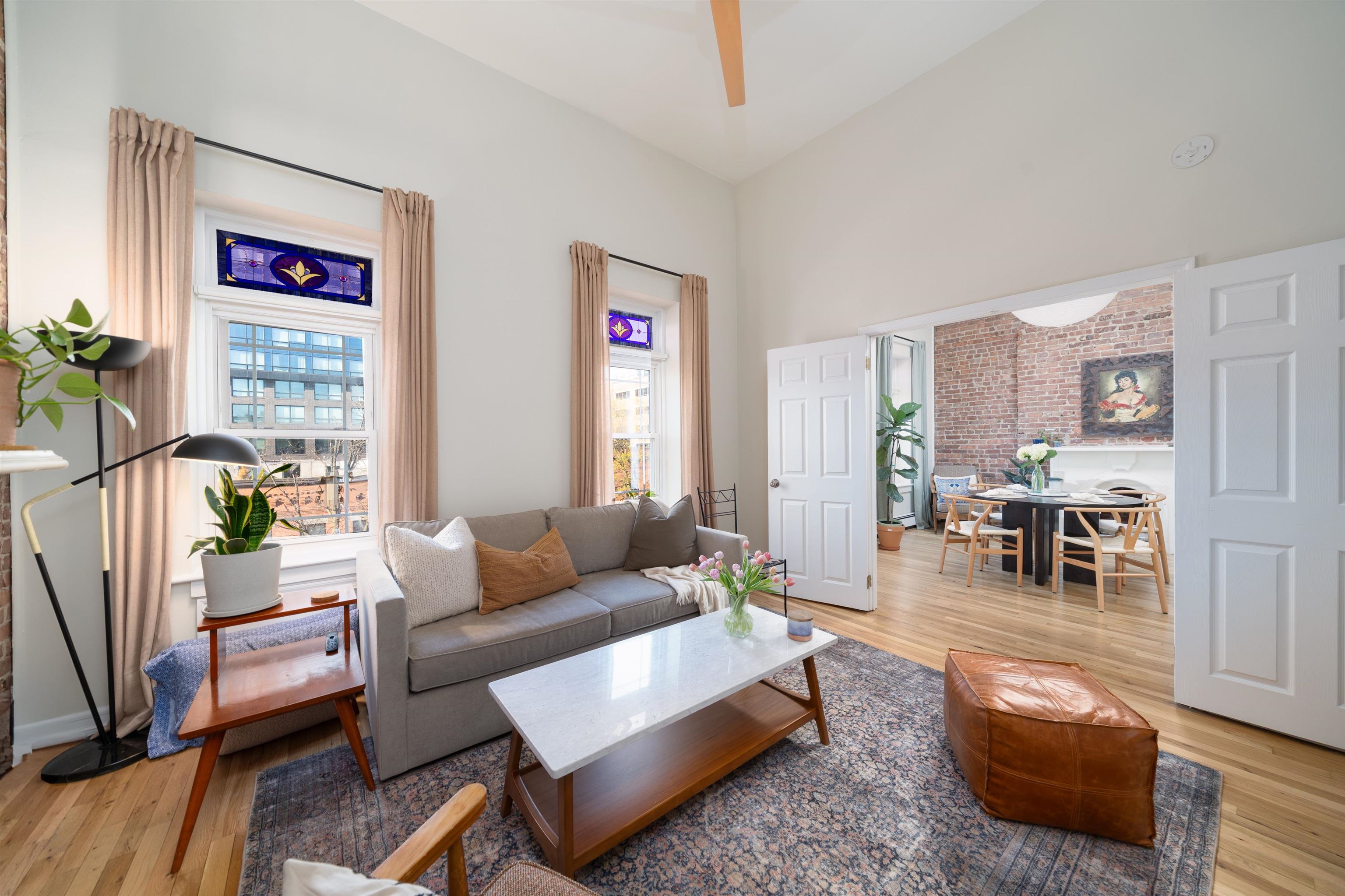 205 14th Street, Unit 4F Hoboken, NJ 07030 - Photo 1 of 22 a living room with furniture and wooden floor