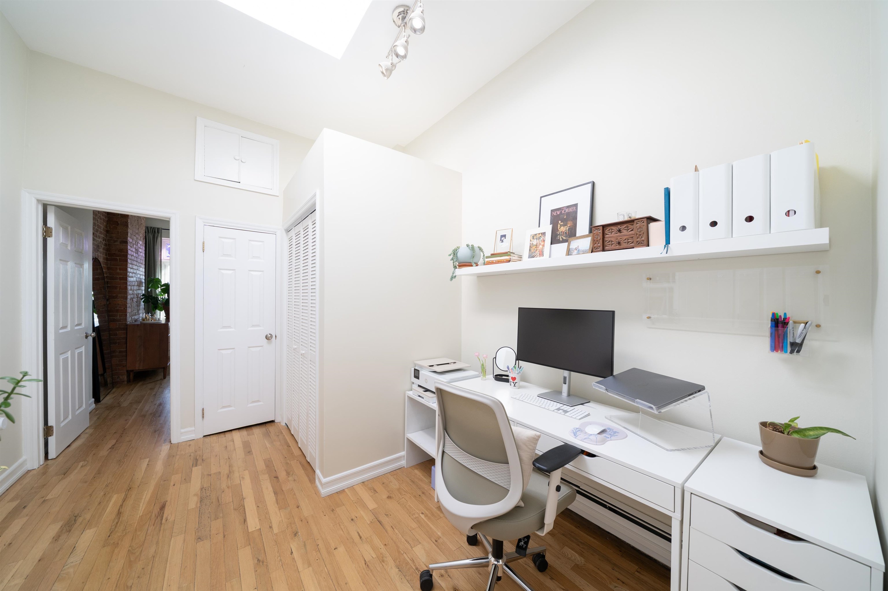 205 14th Street, Unit 4F Hoboken, NJ 07030 - Photo 13 of 22 a view of workspace with wooden floor