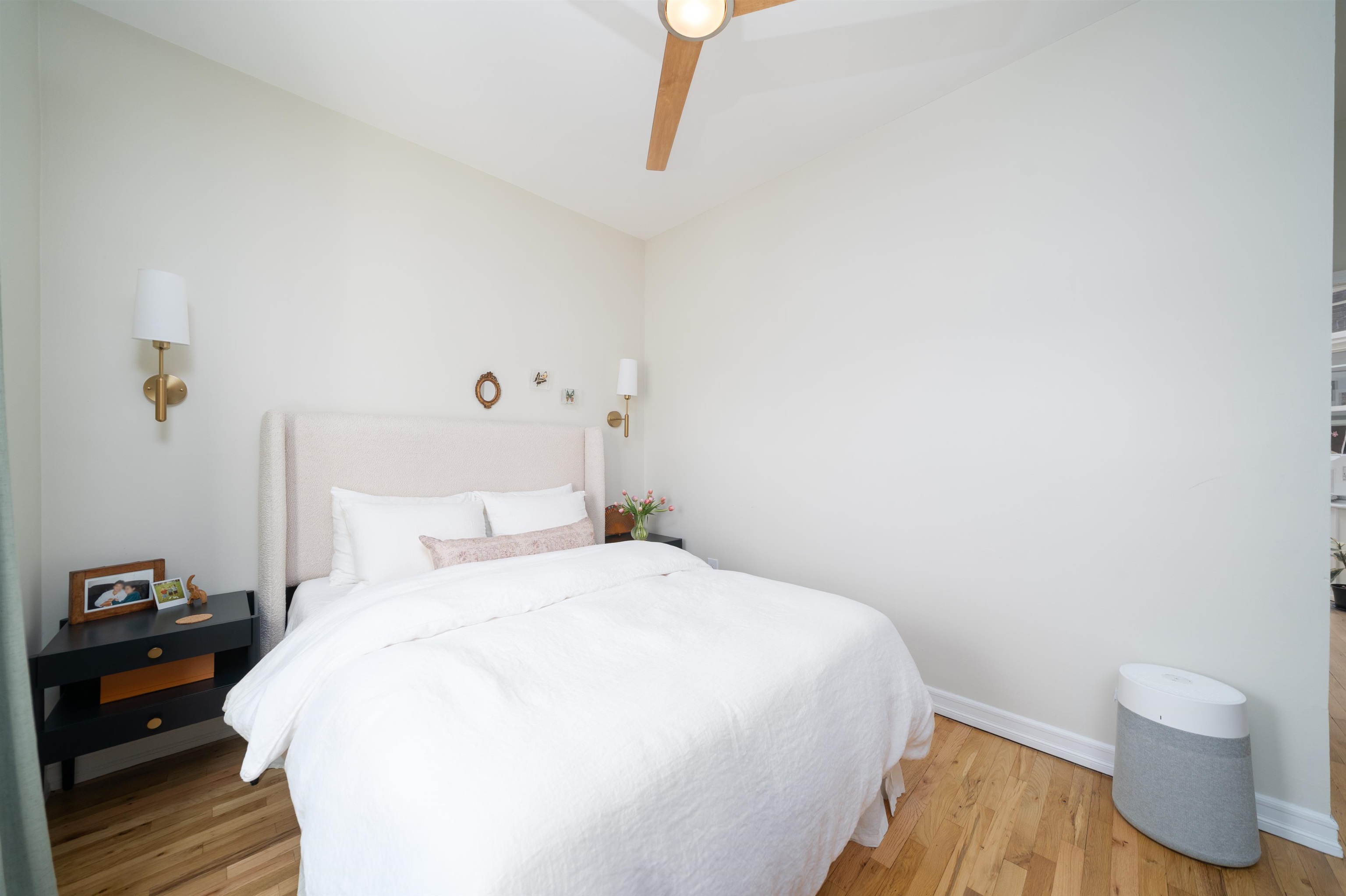 205 14th Street, Unit 4F Hoboken, NJ 07030 - Photo 17 of 22 a bedroom with a bed and a wooden floor