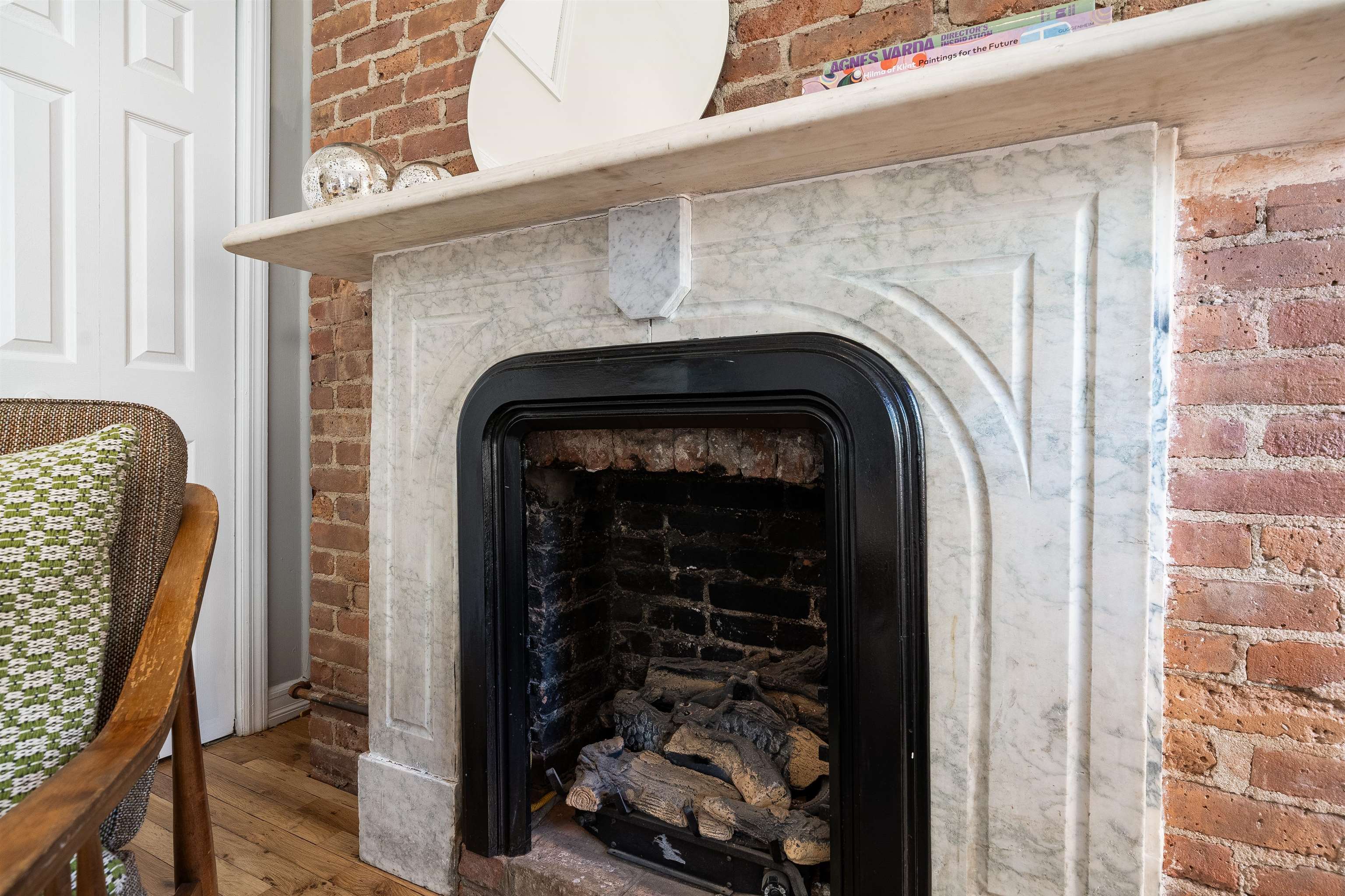 205 14th Street, Unit 4F Hoboken, NJ 07030 - Photo 8 of 22 a view of fireplace and utility room