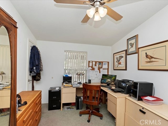 40410 Exa Ely Road Hemet, CA 92544 - Photo 28 of 74 a view of a workspace with furniture and a window
