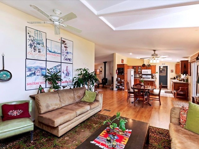 40410 Exa Ely Road Hemet, CA 92544 - Photo 29 of 74 a living room with furniture kitchen view and a dining table