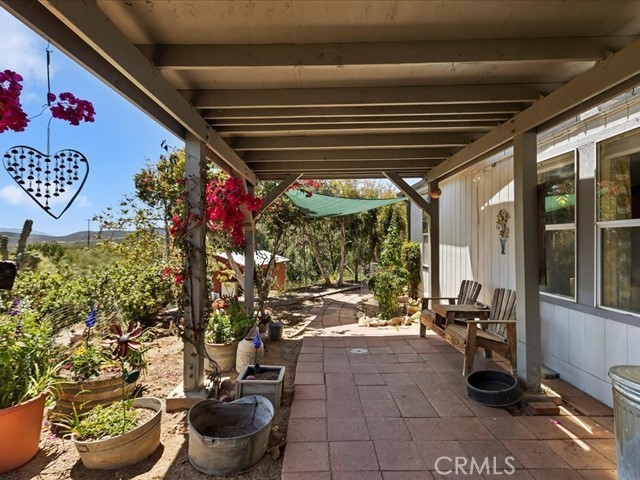 40410 Exa Ely Road Hemet, CA 92544 - Photo 37 of 74 a view of a chairs and table in a patio