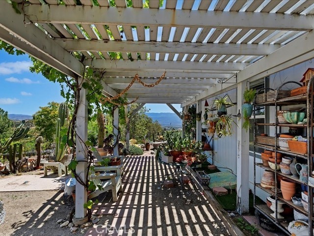 40410 Exa Ely Road Hemet, CA 92544 - Photo 41 of 74 a view of a chairs and table in a patio