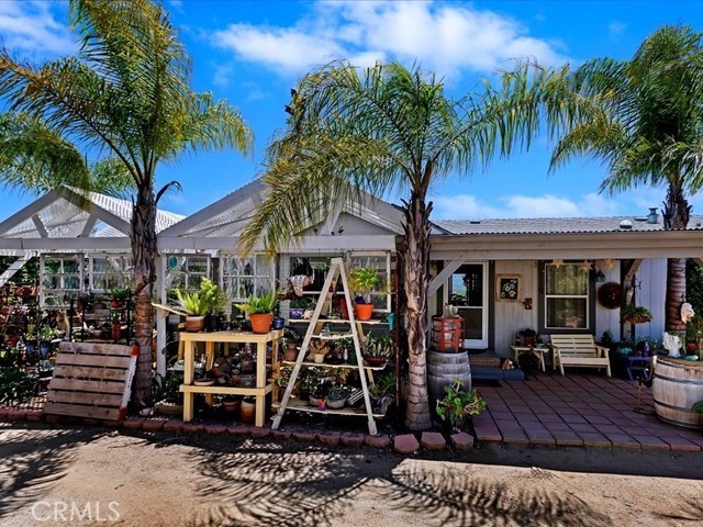 40410 Exa Ely Road Hemet, CA 92544 - Photo 42 of 74 a view of a chairs and tables in patio