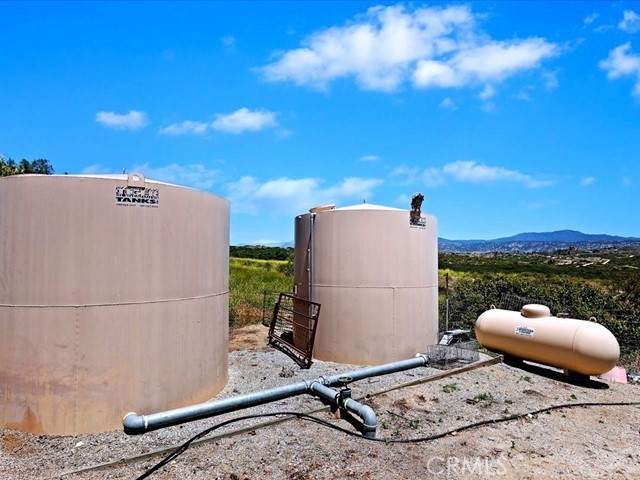40410 Exa Ely Road Hemet, CA 92544 - Photo 47 of 74 a backyard of a house with table and chairs