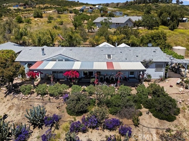 40410 Exa Ely Road Hemet, CA 92544 - Photo 66 of 74 an aerial view of a house with yard and outdoor seating