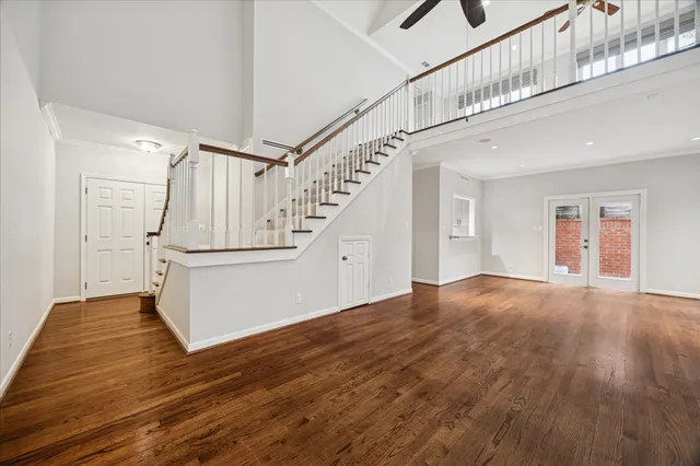 a view of an entryway with wooden floor